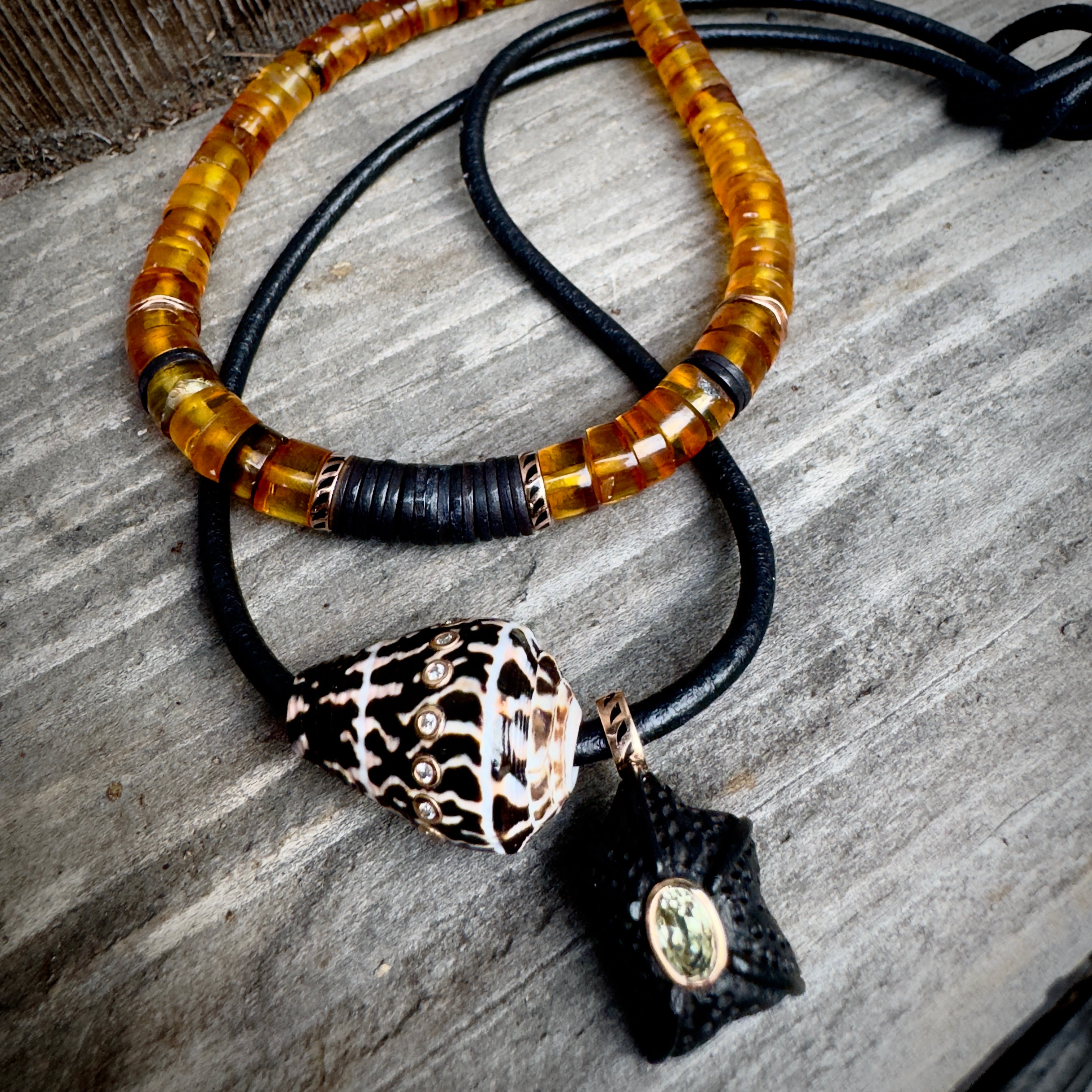 Dezso 18k Classic Carved Ebony Starfish with Oval Beryl Pendant