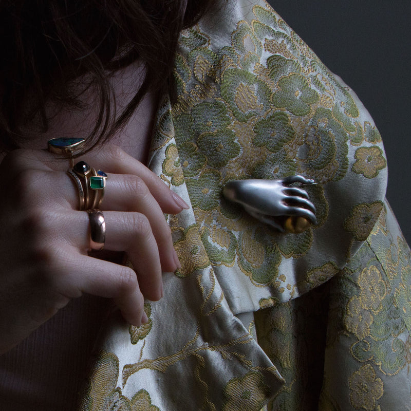 Gabriella Kiss Sterling Silver "Canova" Hand with Vermeil Plum Pin